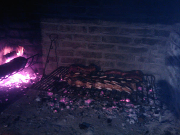 asado being cooked, Uruguay - Uruguayuruguay.com